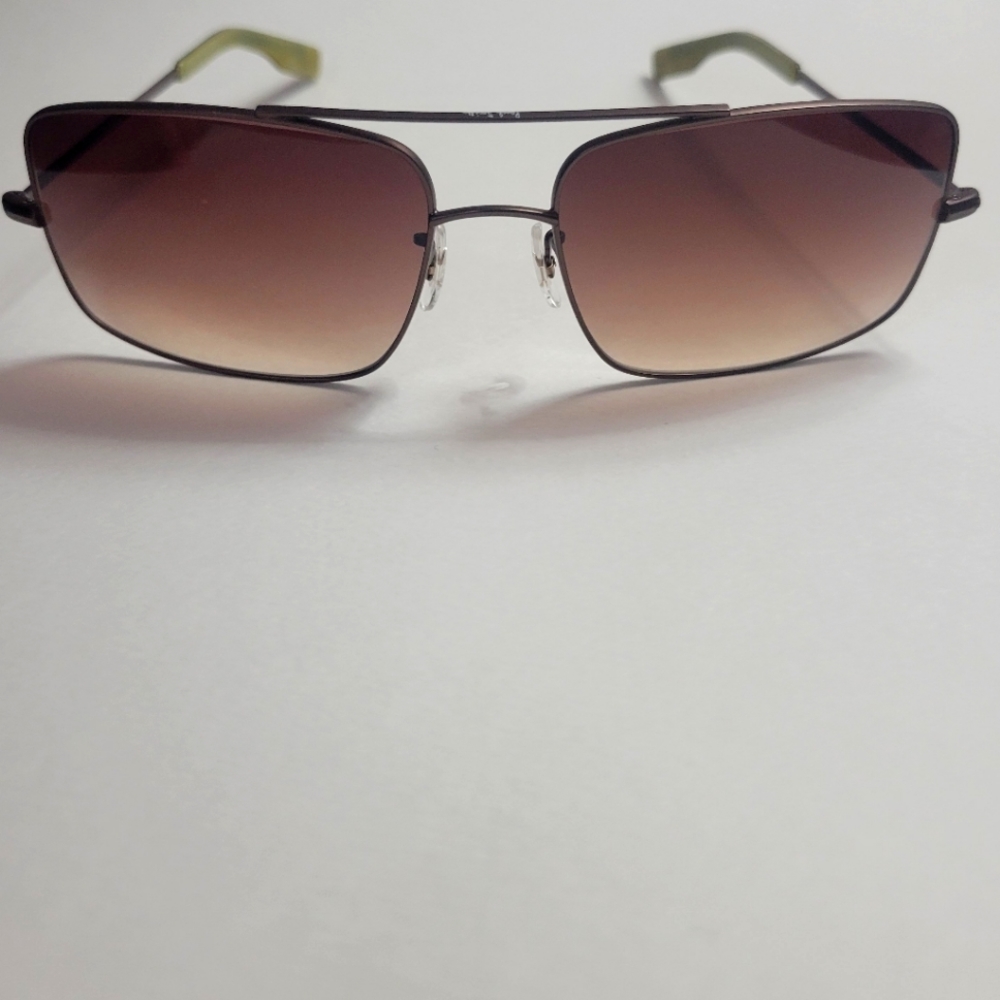 Paul Smith Sunglasses bronze and rainbow detail on temples.